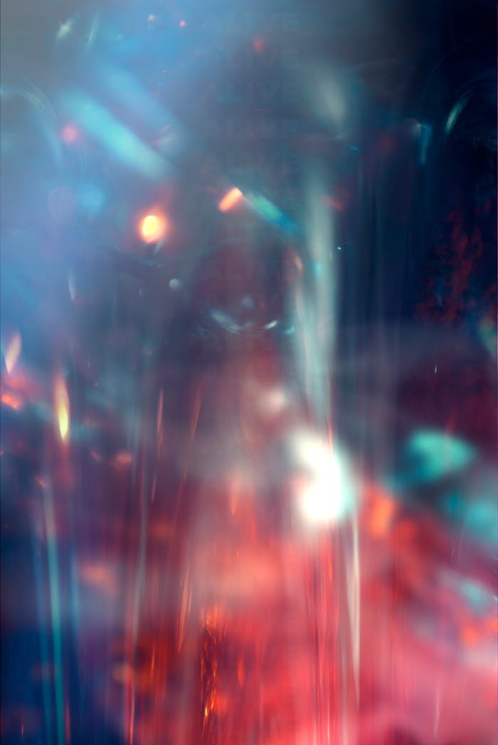 Vivid abstract composition of blurred light refractions creating an ethereal bokeh effect.